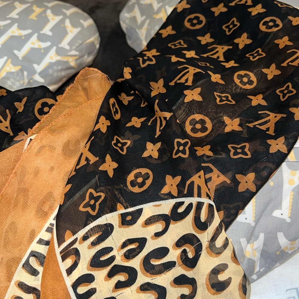 Beautiful scarf with monogram design & animal print ends